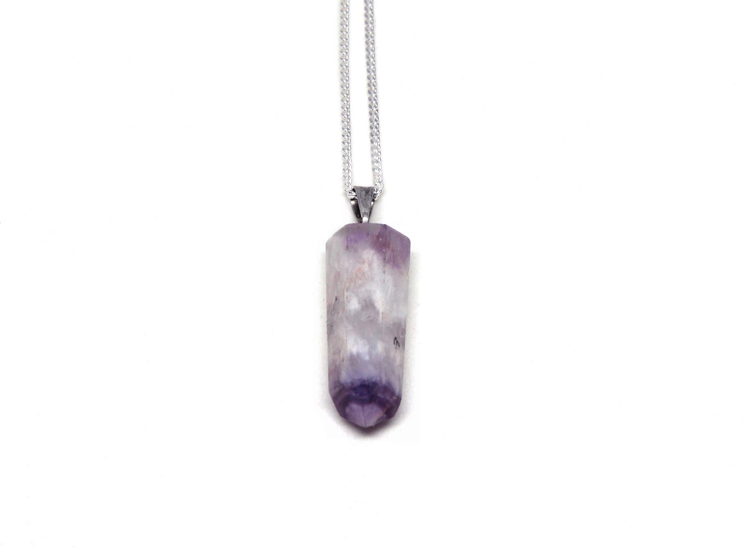 Amethyst point stone on silver chain pendant necklace. Charms and healing crystal stones jewelry made in New York by llayers.