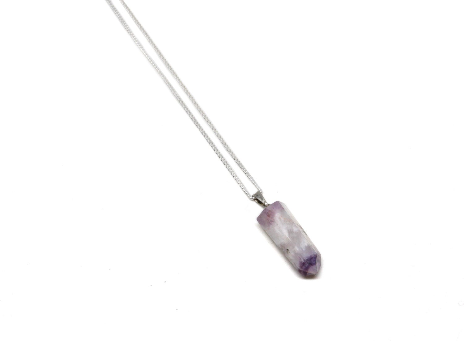 Amethyst point stone on silver chain pendant necklace. Charms and healing crystal stones jewelry made in New York by llayers.