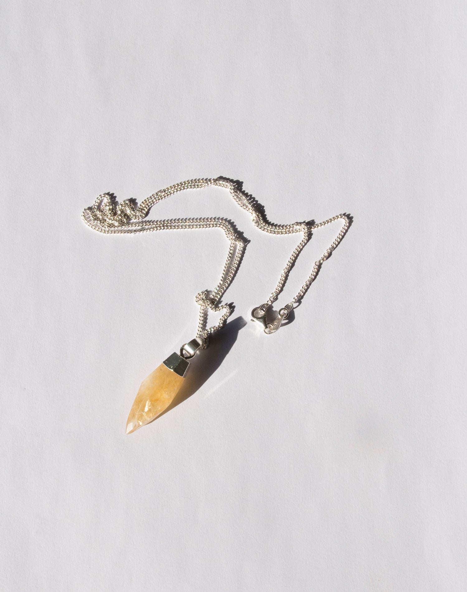 Citrine silver stone pendant necklace. Charms and healing crystal stones jewelry, made in Brooklyn NY by llayers.