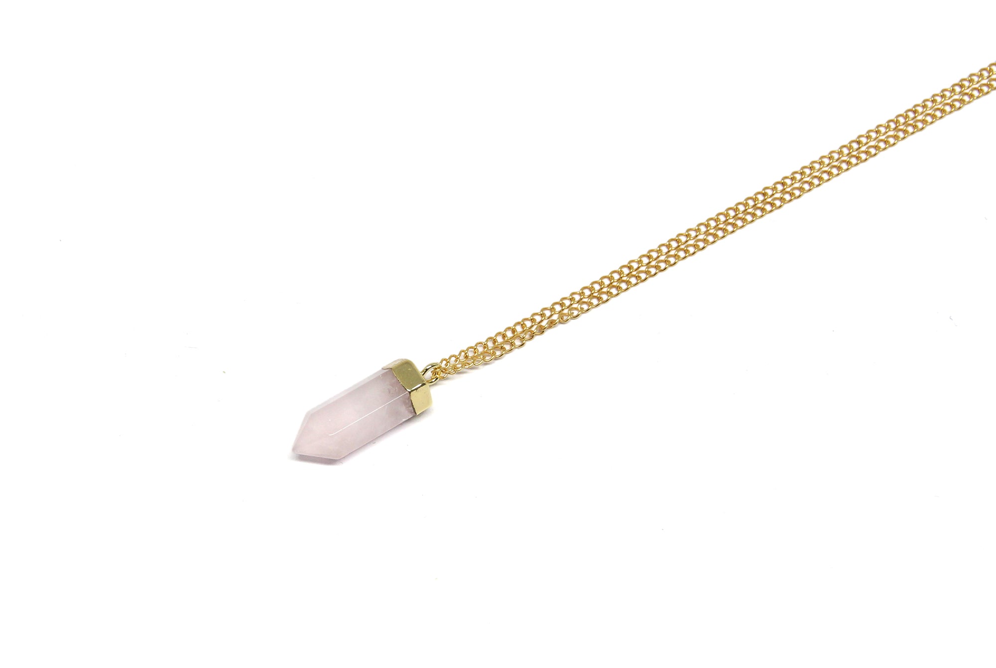 Gold Rose quartz point pendant necklace. Charms and healing crystal stones jewelry, made in Brooklyn New York by llayers.