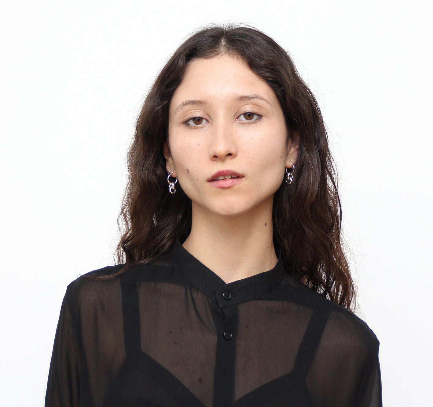 Silver hoop earrings infinity minimal jewelry. Minimalist timeless affordable jewelry handcrafted in New York by llayers.