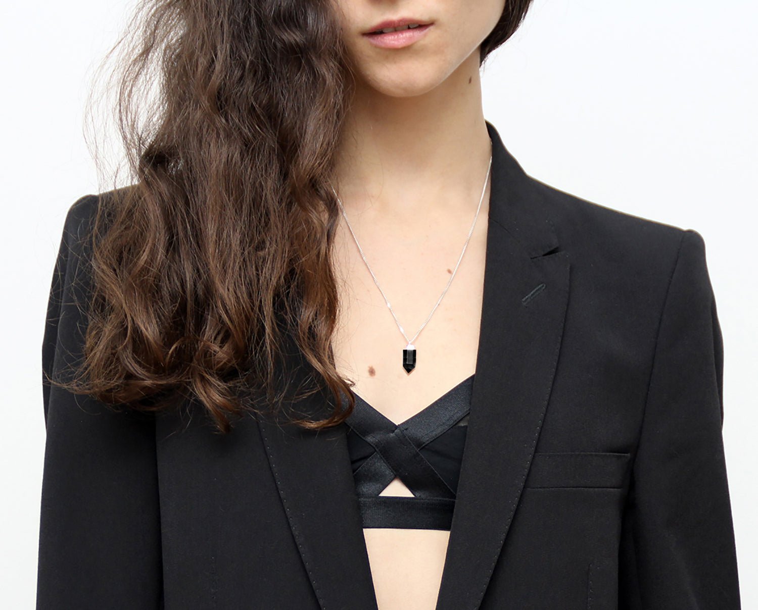 Black onyx point pendant silver necklace. Charms and healing crystal stones jewelry in Brooklyn New York by llayers.