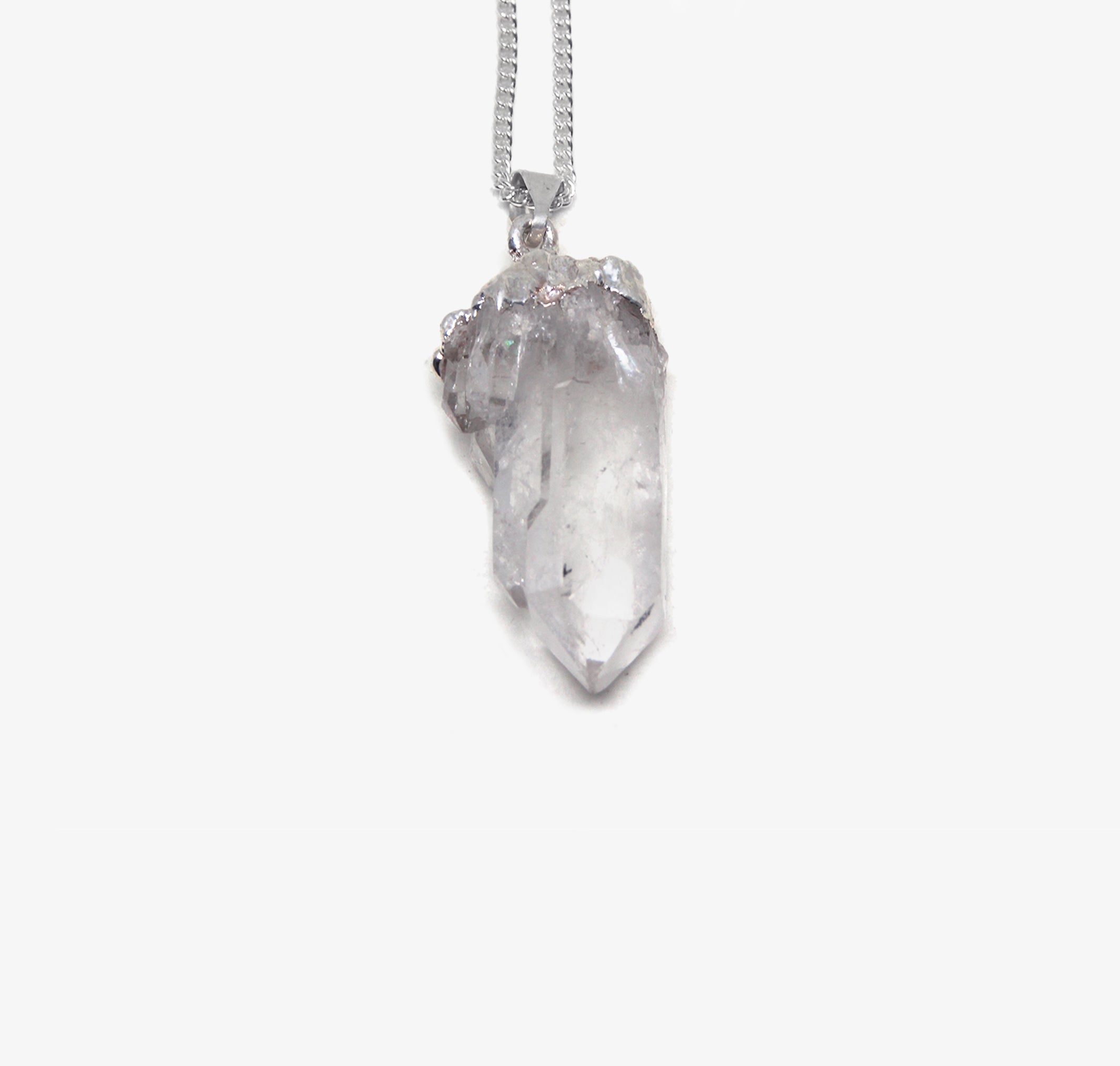 Quartz Crystal stone pendant silver necklace. Charms and healing crystal stones jewelry, made in New York by llayers.