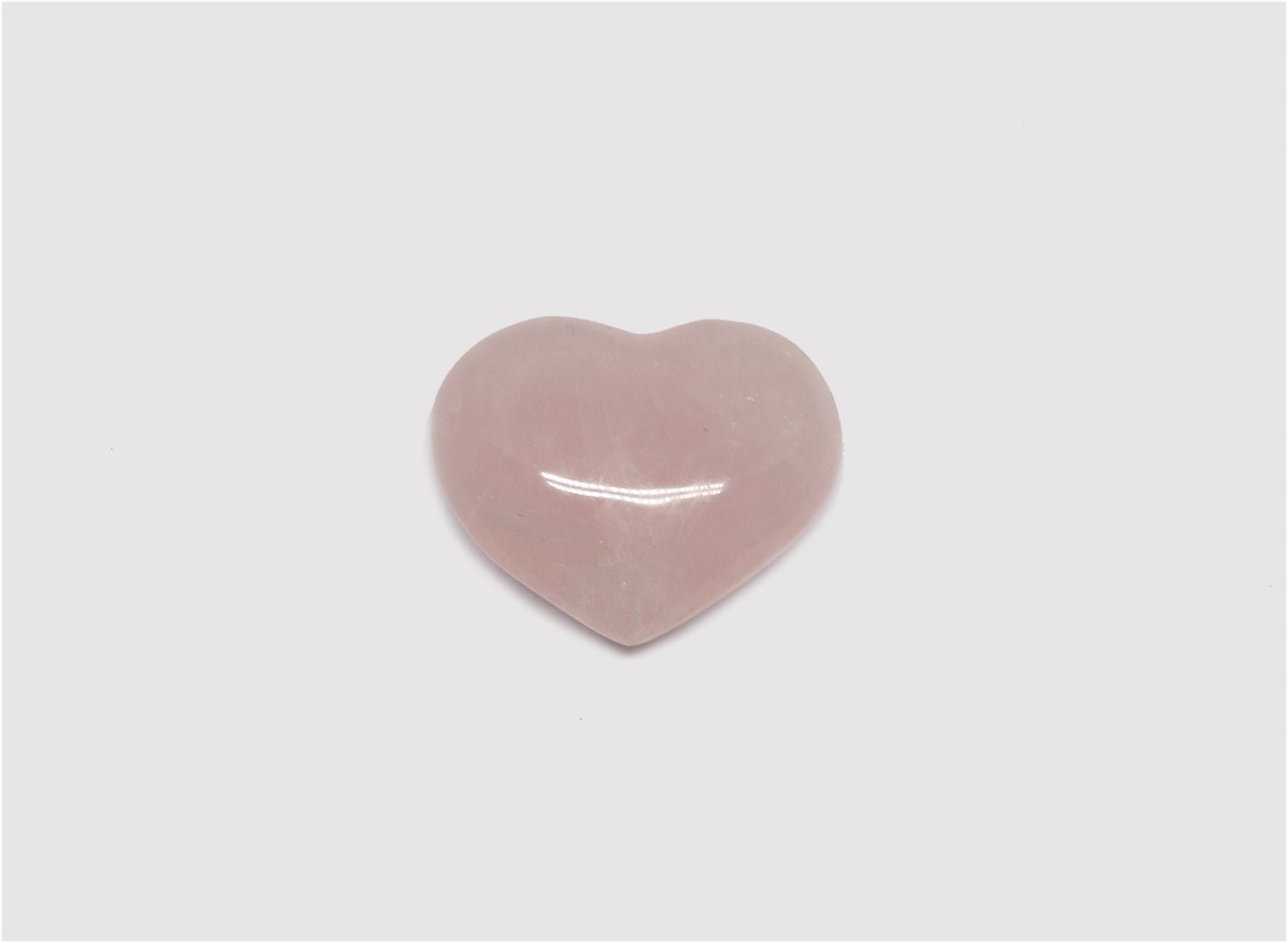 pink rose quartz crystal heart healing stone wellness by llayers in Brooklyn New York