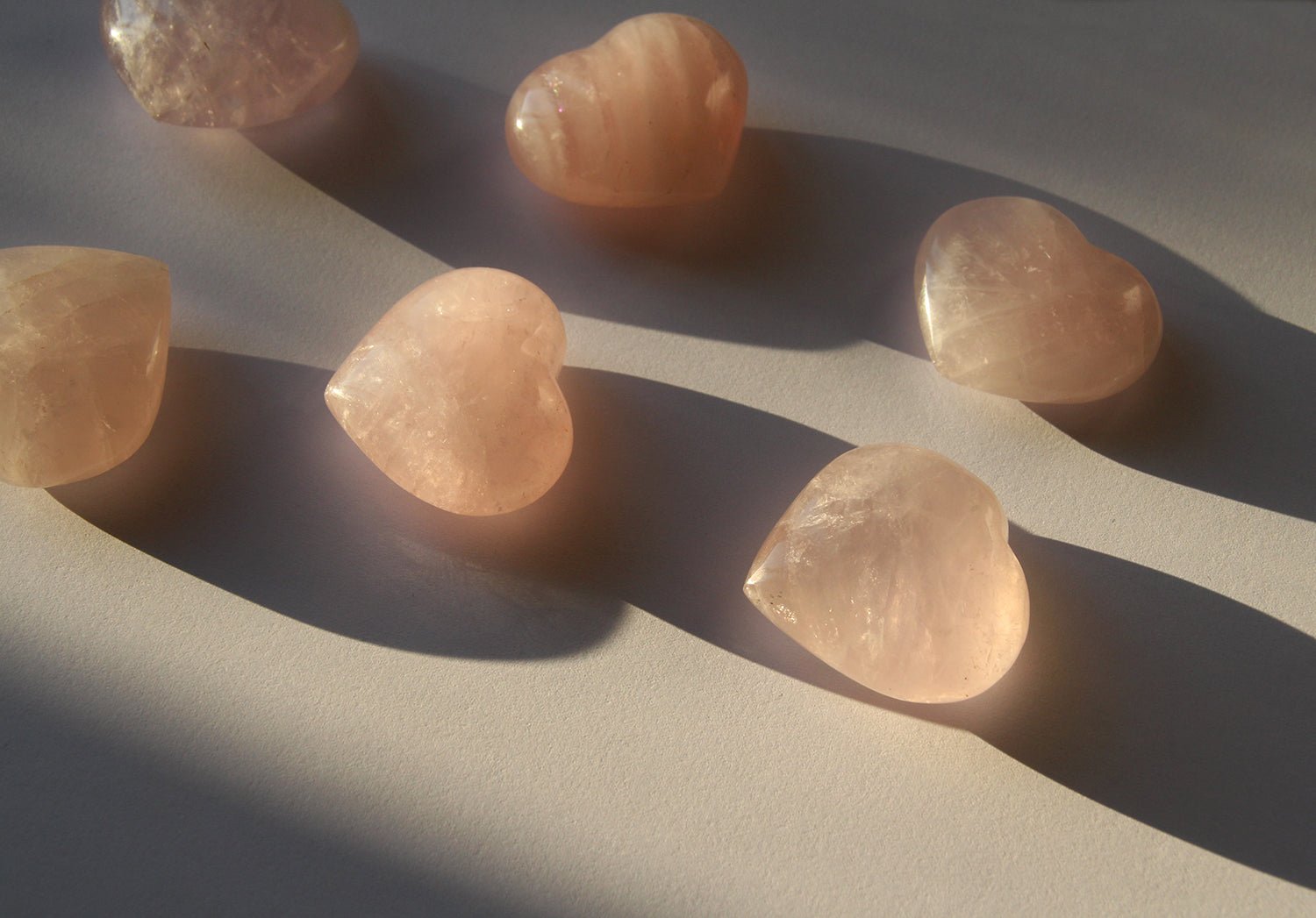 pink rose quartz crystal heart healing stone wellness by llayers in Brooklyn New York