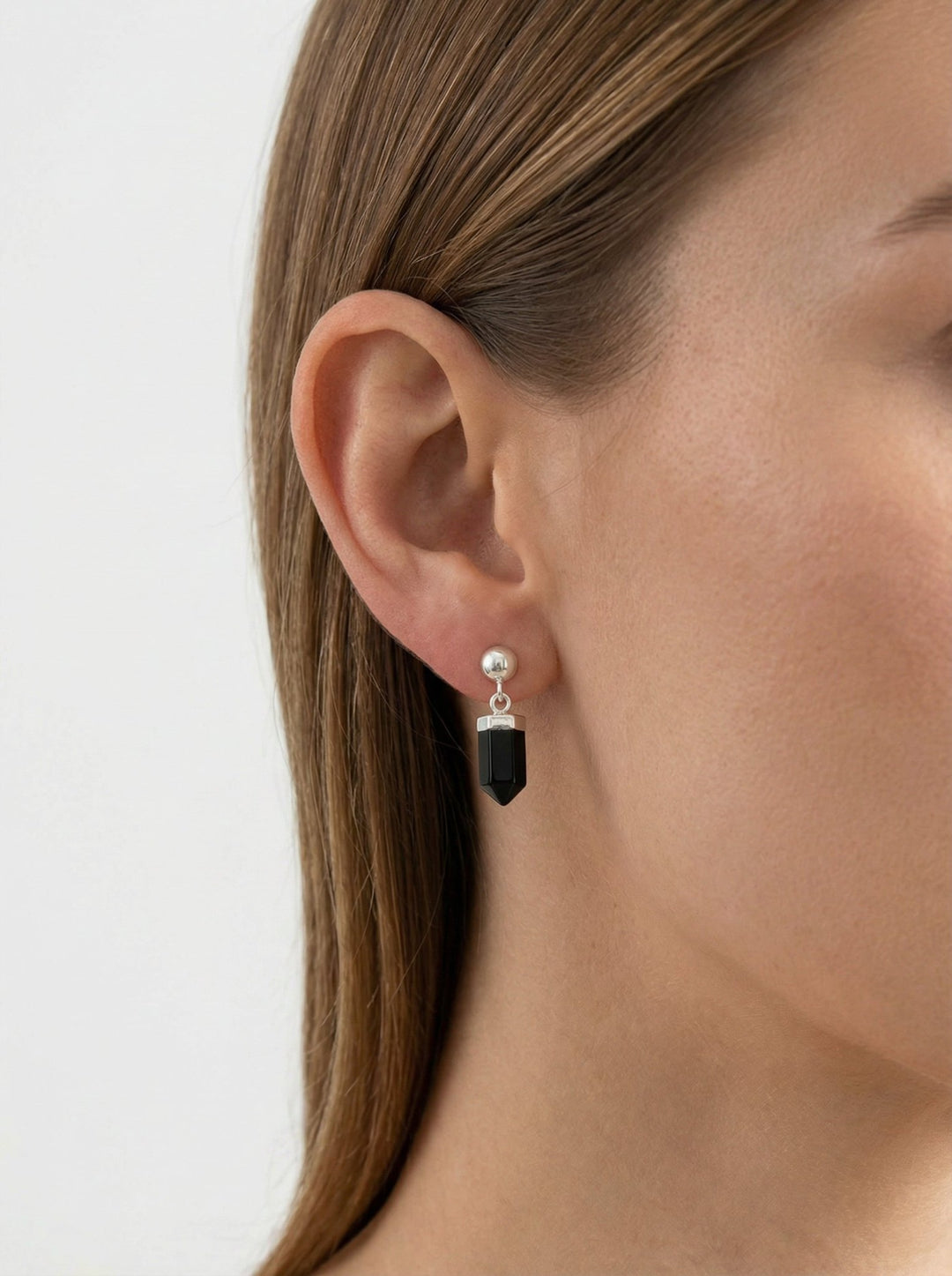 Black Agate stone earrings on a silver sphere. Minimal jewelry in the Us, New York by llayers.