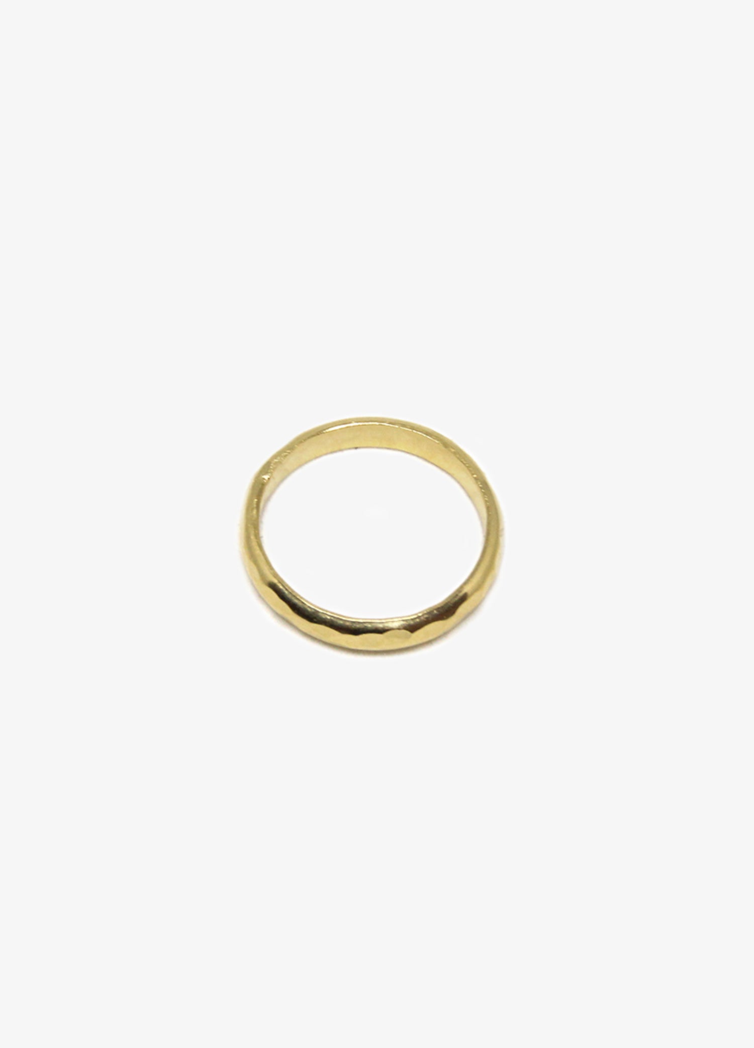 Men's Minimalist gold hammered round ring. Minimalist engagement rings in Brooklyn New York by designer llayers.