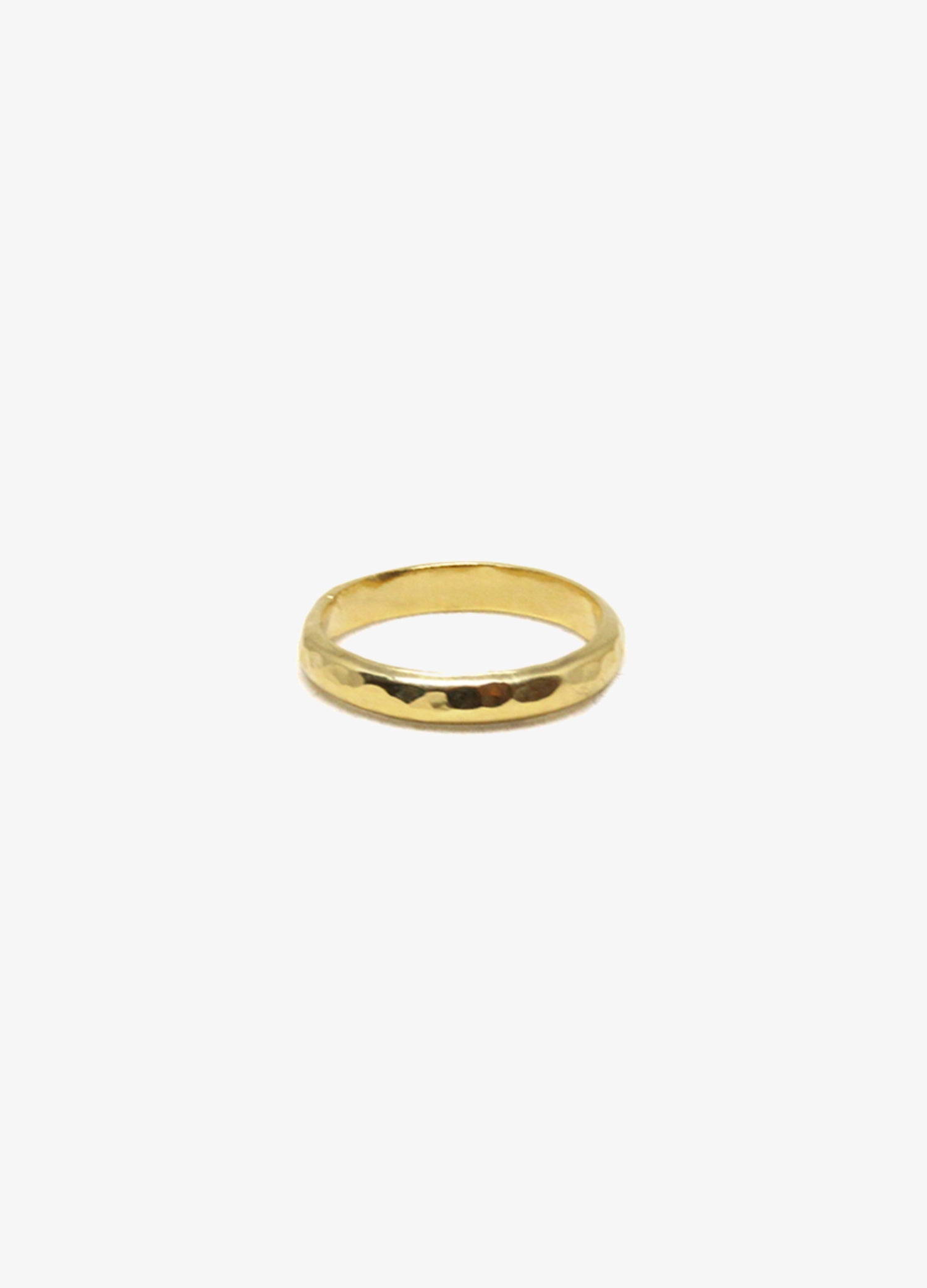 Engagement gold hammered round ring. Minimalist engagement rings in Brooklyn New York by designer llayers.