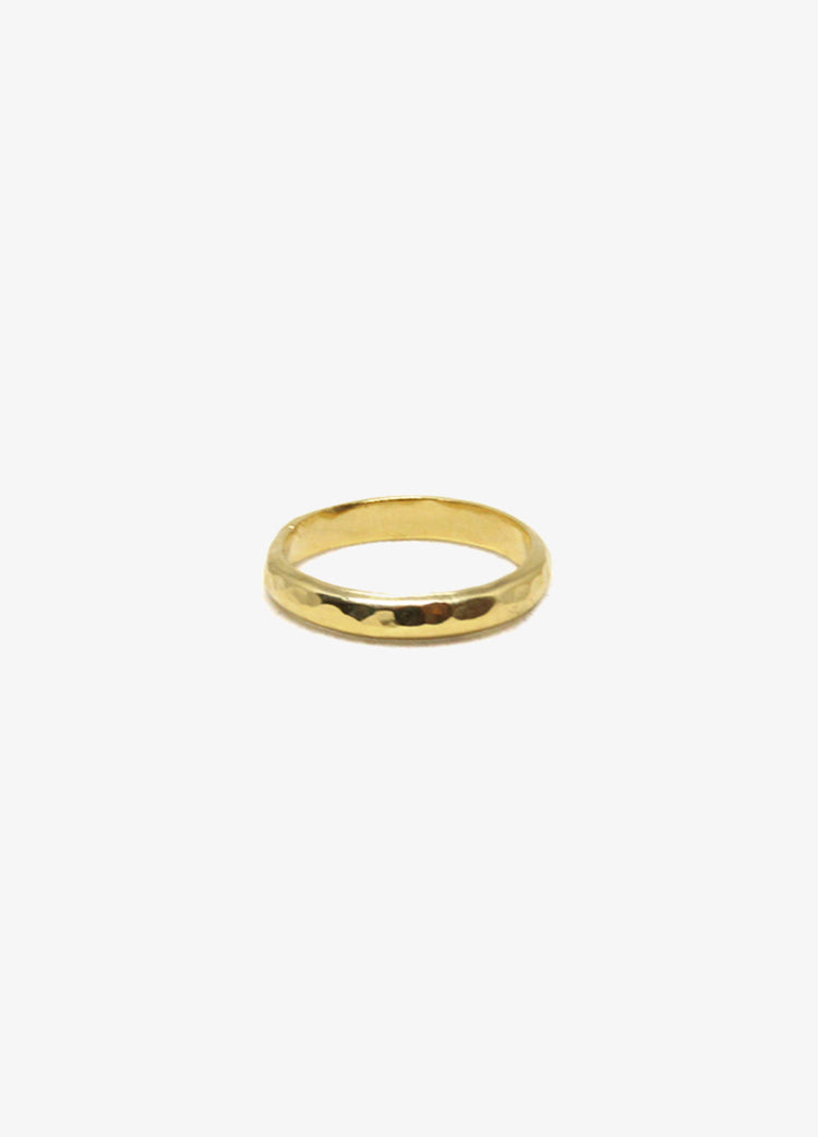 Engagement gold hammered round ring. Minimalist engagement rings in Brooklyn New York by designer llayers.