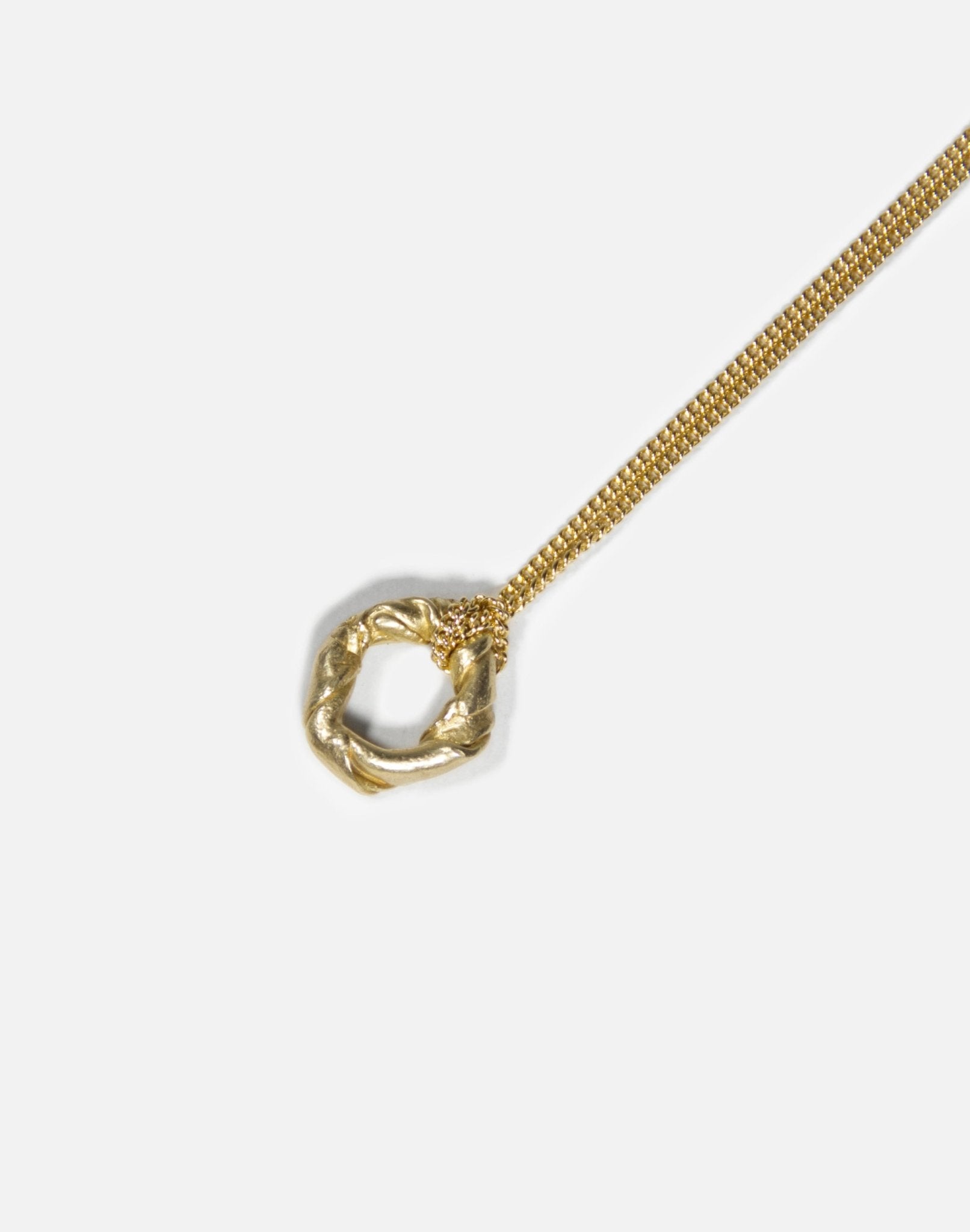 Gold brass modern pendant necklace. Jewelry made in Brooklyn New York by designer llayers.