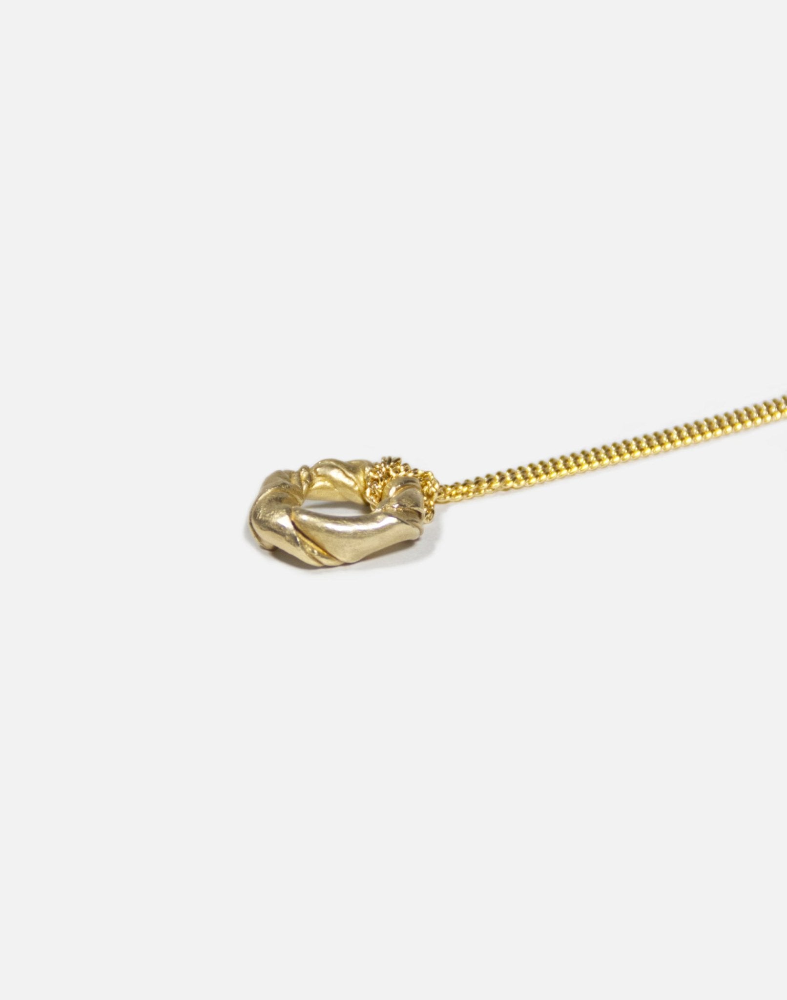 Gold brass modern pendant necklace. Jewelry made in Brooklyn New York by designer llayers.