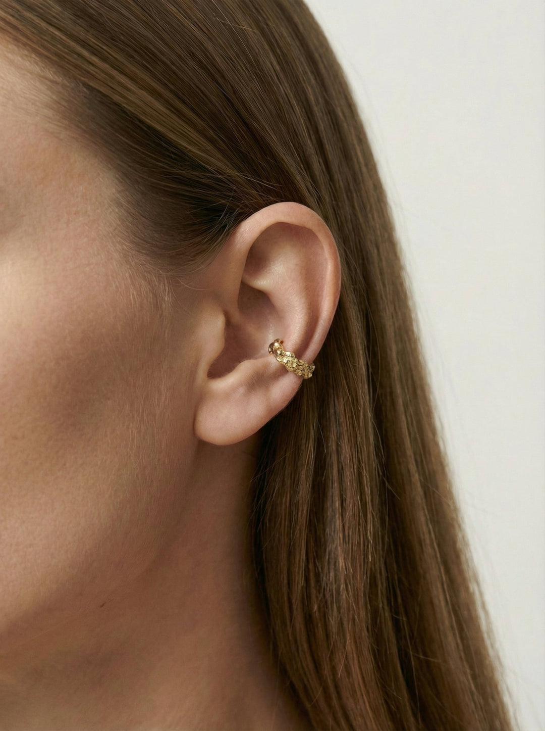 Gold textured ear cuff earrings. Emerging designer. Minimalist jewelry made in Brooklyn New York by llayers.