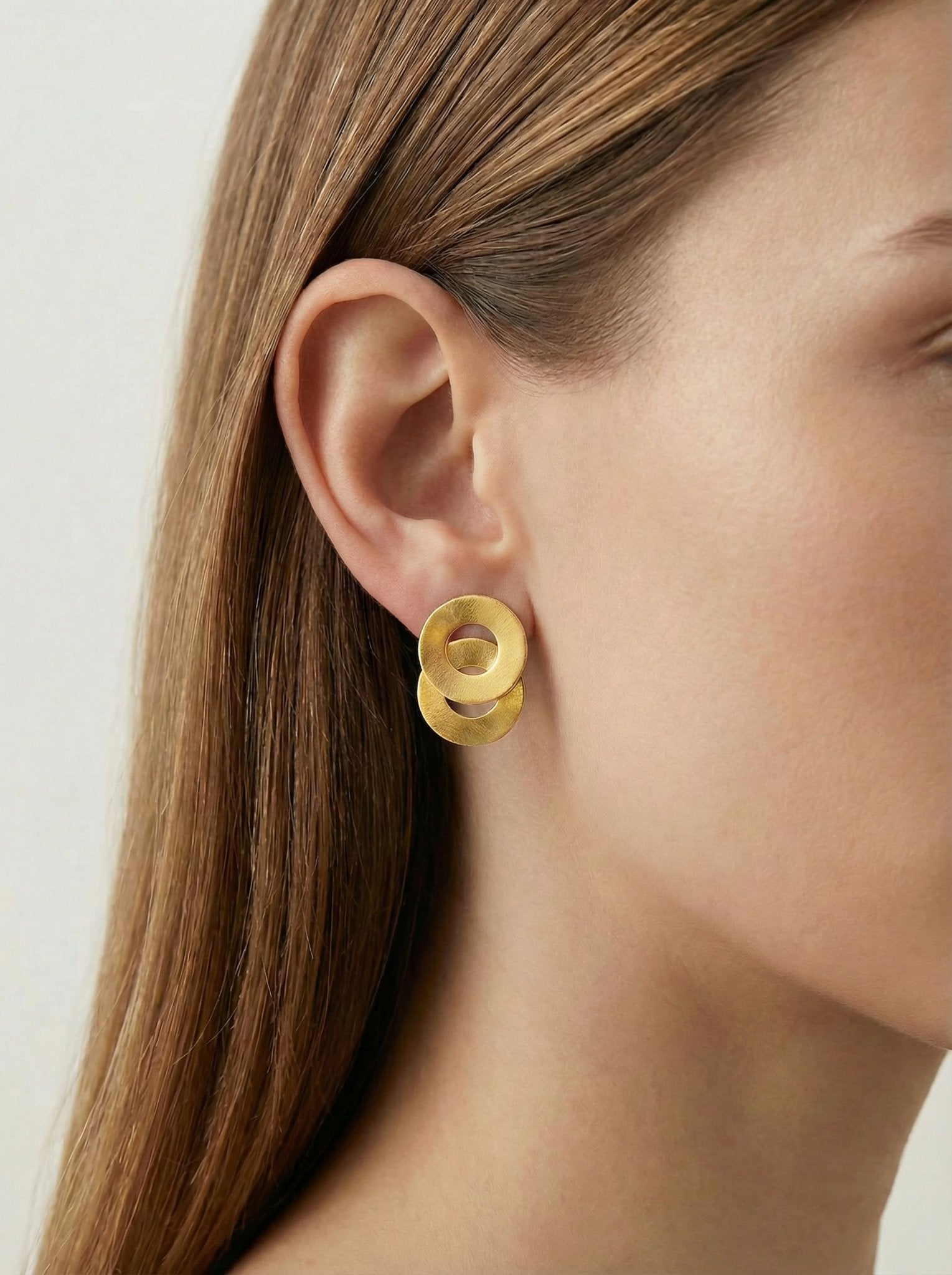 Geometric circle gold modern earrings. Modern minimalist timeless jewelry made in Brooklyn New York by llayers.