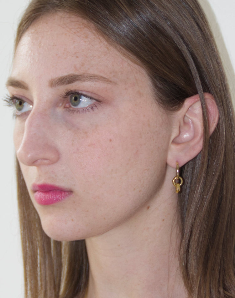 gold hoop earrings minimal infinity in brooklyn new york llayers