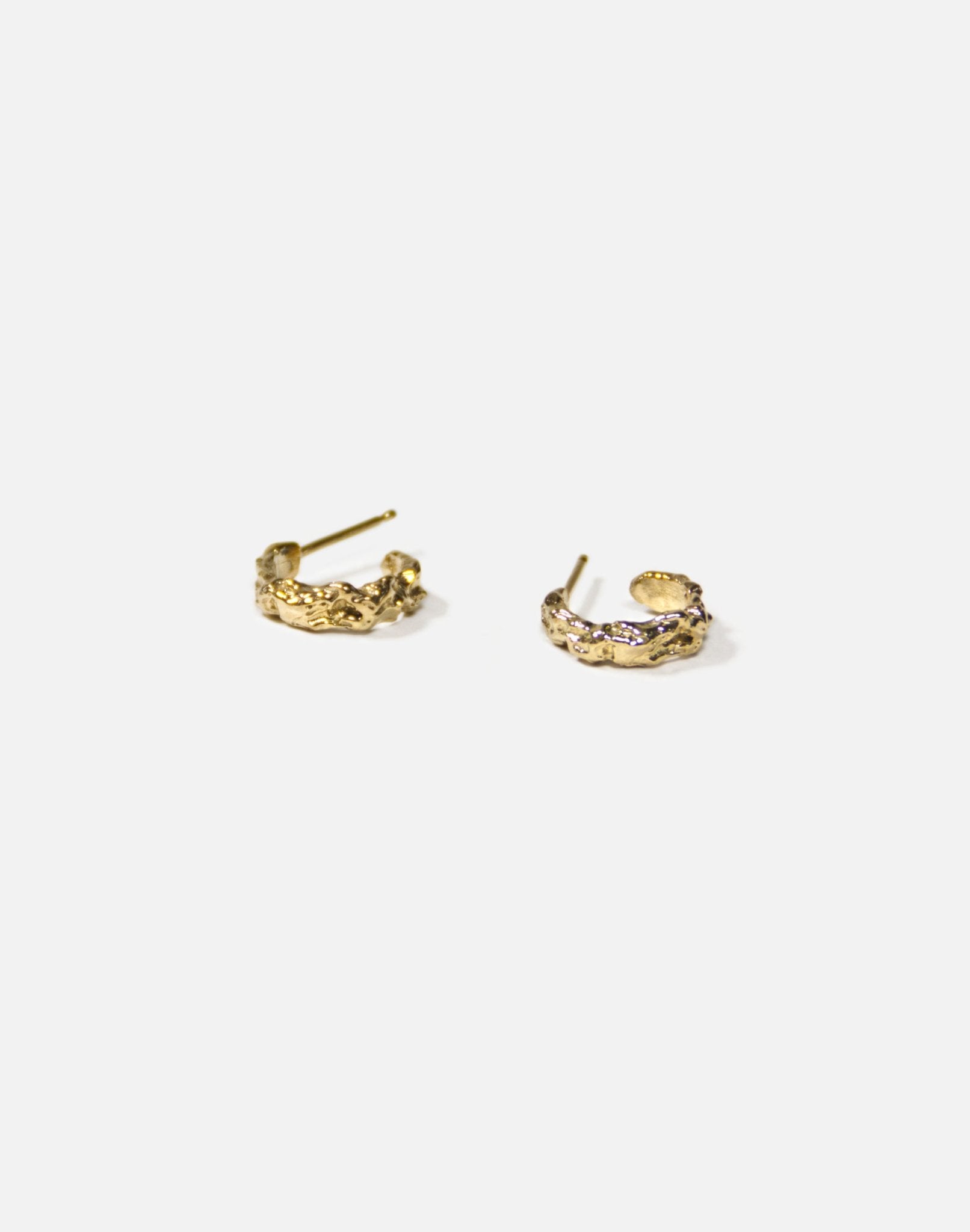 Gold textured hoop earrings granite. Emerging designer. Minimalist jewelry made in Brooklyn New York by llayers.