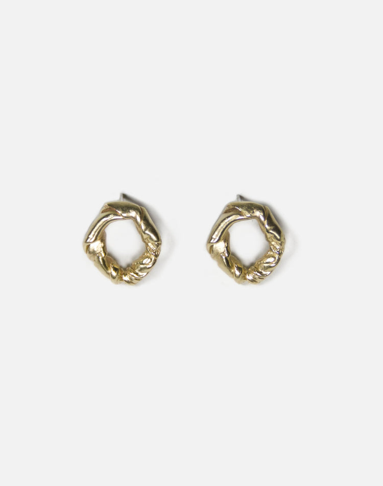 Gold brass minimalist modern twisted earrings. Made in Brooklyn New York by designer llayers.