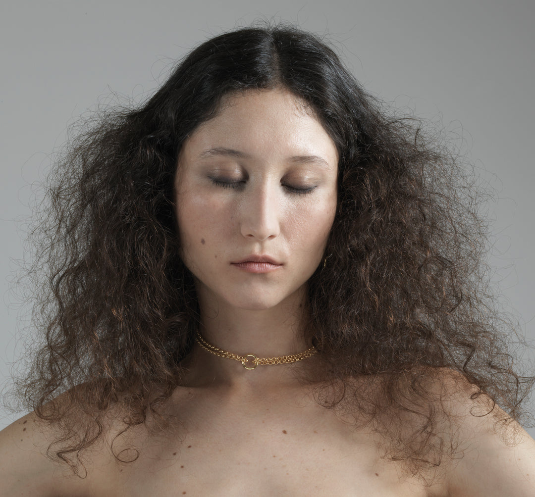 Gold minimalist necklace with ring handmade in Brooklyn New York by minimalist designer llayers jewelry