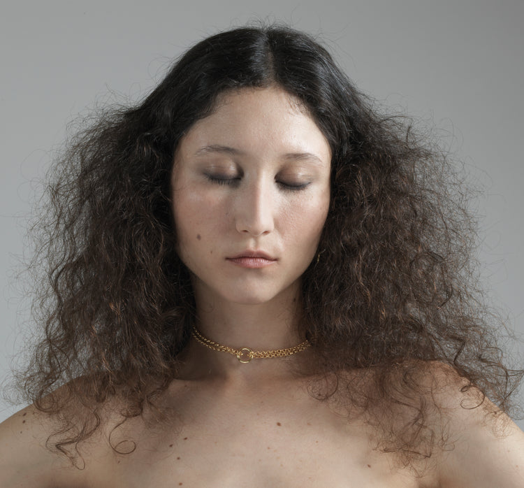 Gold minimalist necklace with ring handmade in Brooklyn New York by minimalist designer llayers jewelry
