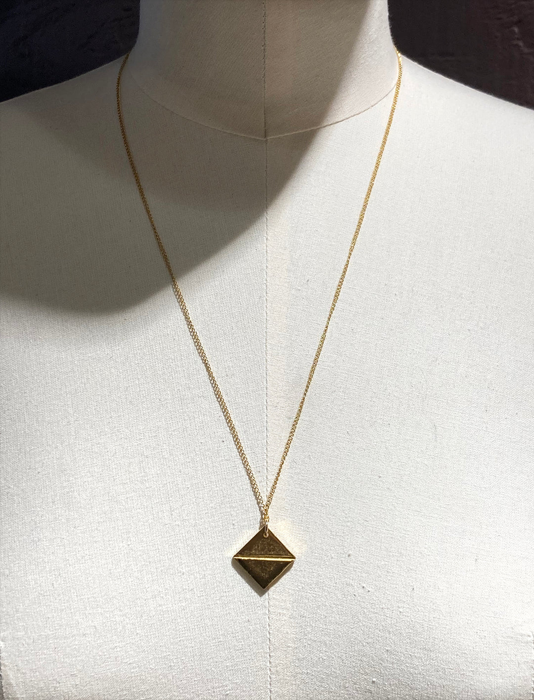 Gold talisman pendant necklace synthesis new york brooklyn by unisex minimalist jewelry designer llayers