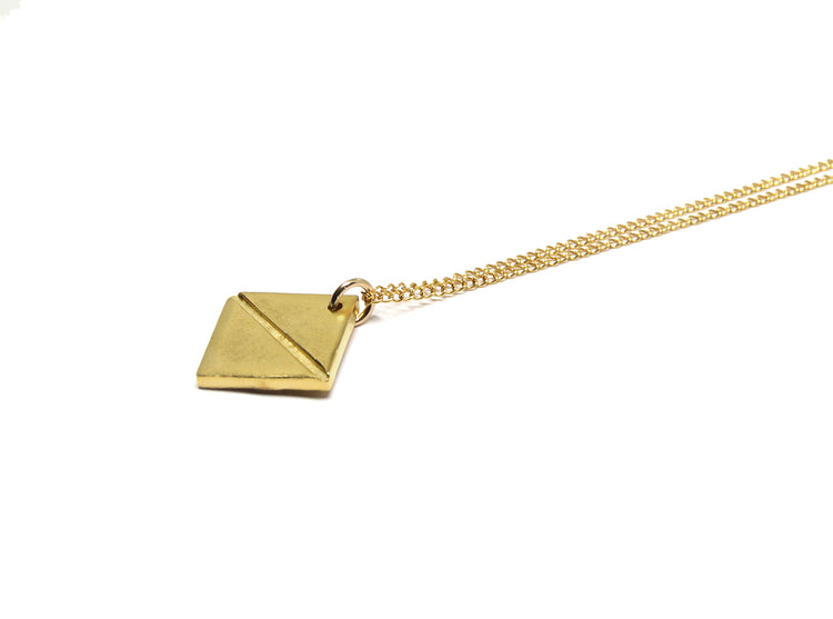 Gold talisman pendant necklace synthesis new york brooklyn by unisex minimalist jewelry designer llayers