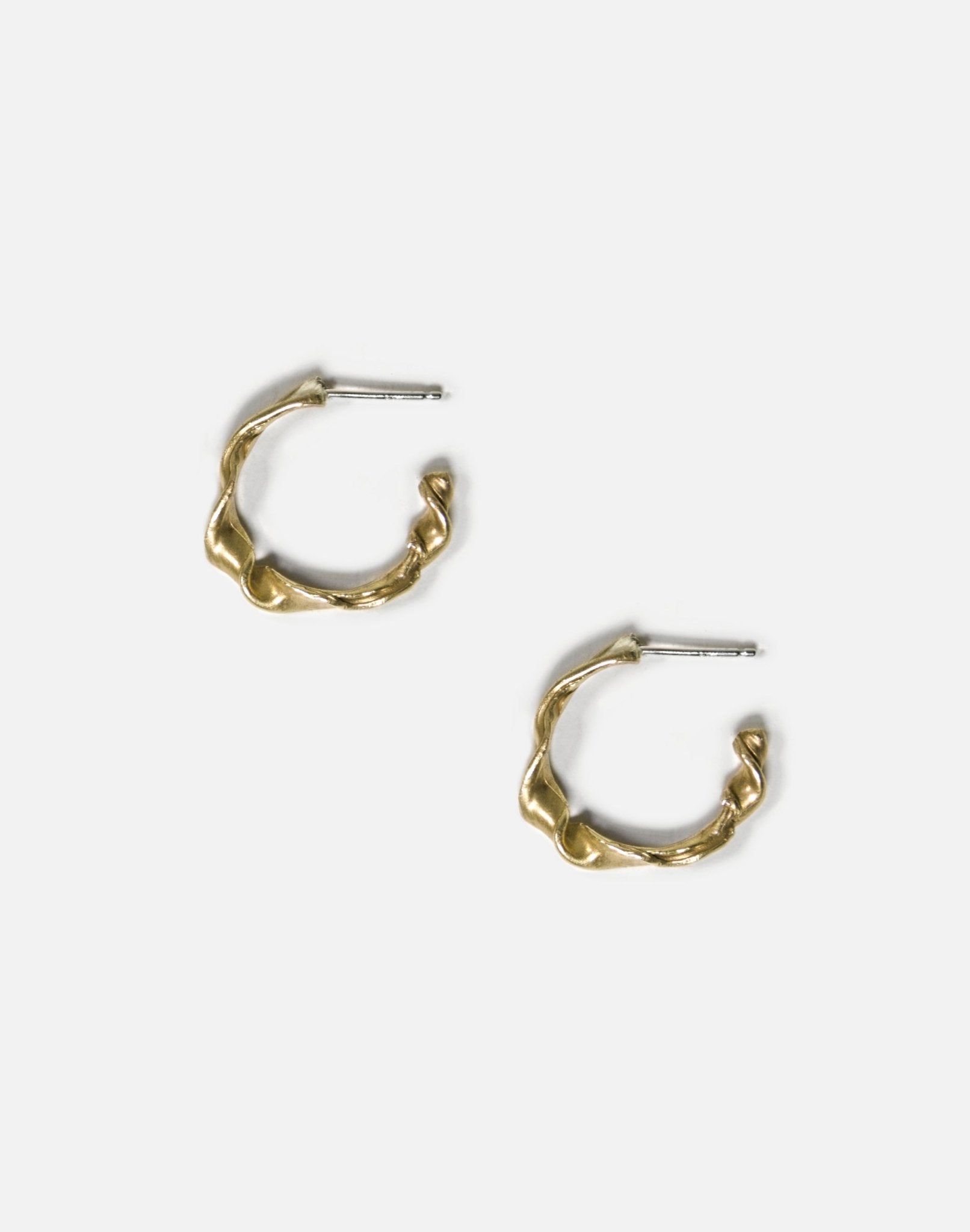 Men's Gold twisted hoop earrings essence. Best minimalist jewelry made in Brooklyn New York by llayers.
