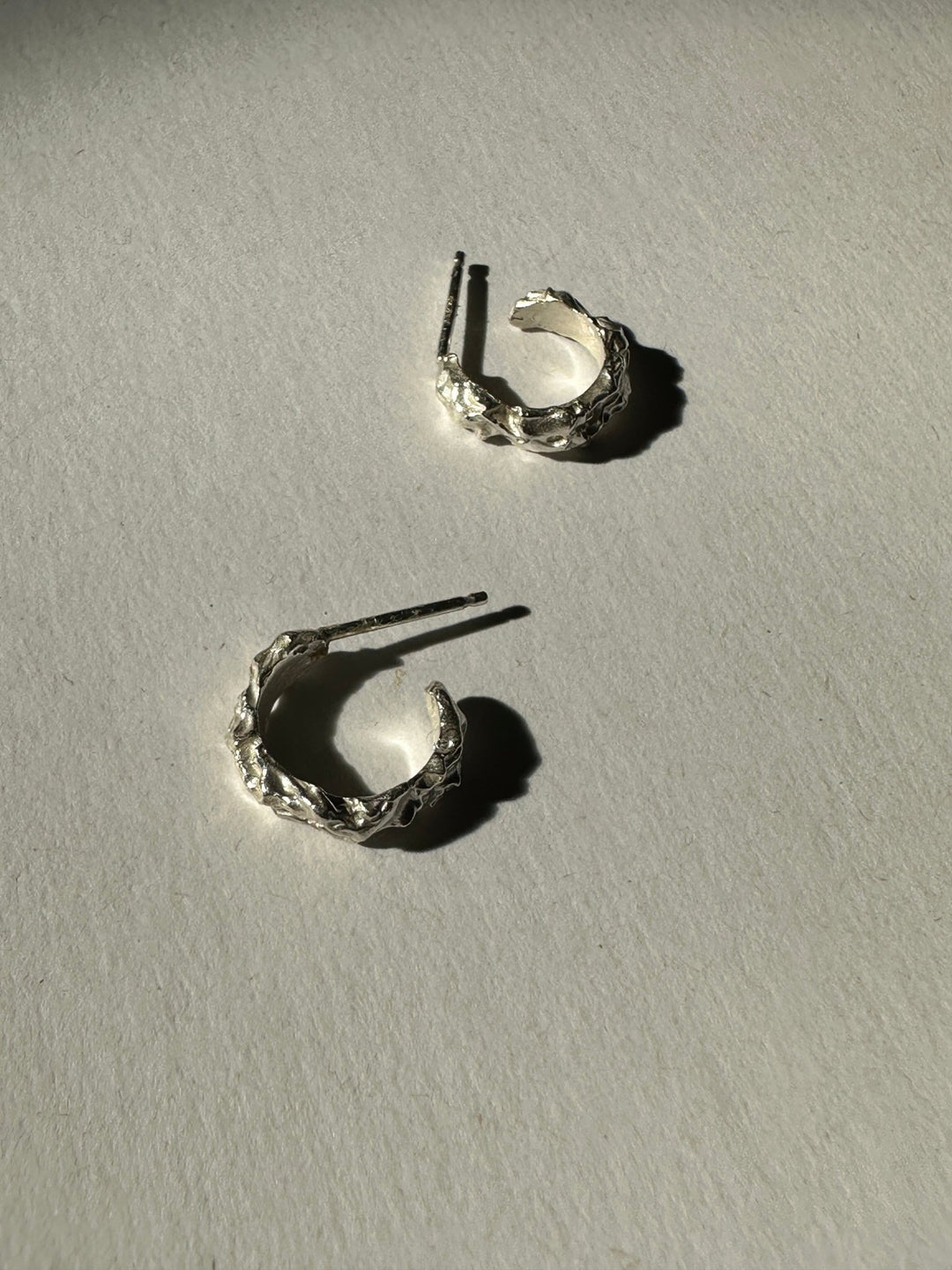 Men's Minimal Sterling silver hoop earrings. Emerging designer. Minimalist jewelry made in Brooklyn New York by llayers.