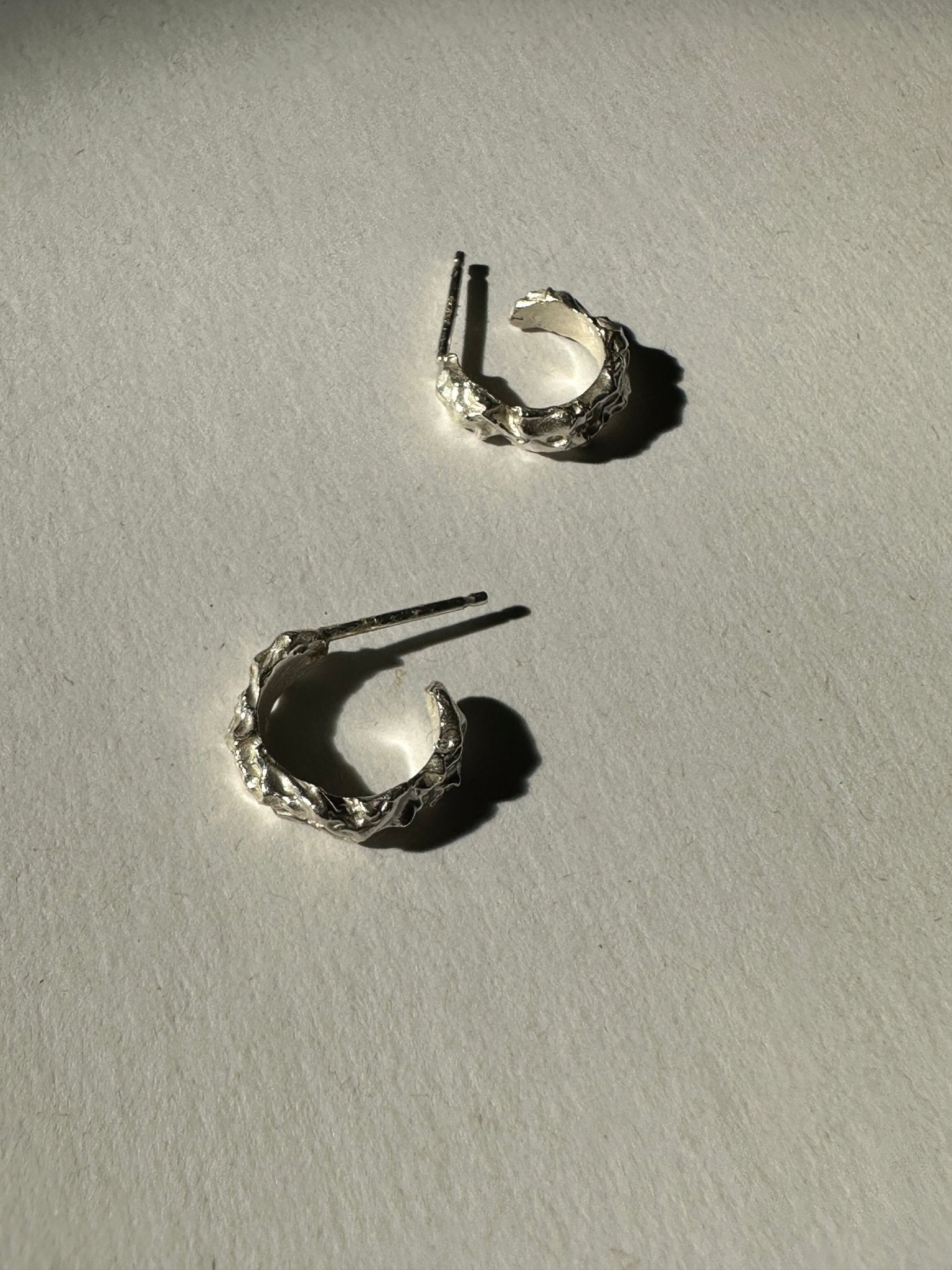 Men's Minimal Sterling silver hoop earrings. Emerging designer. Minimalist jewelry made in Brooklyn New York by llayers.