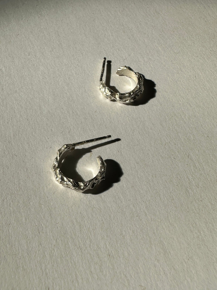 Men's Minimal Sterling silver hoop earrings. Emerging designer. Minimalist jewelry made in Brooklyn New York by llayers.