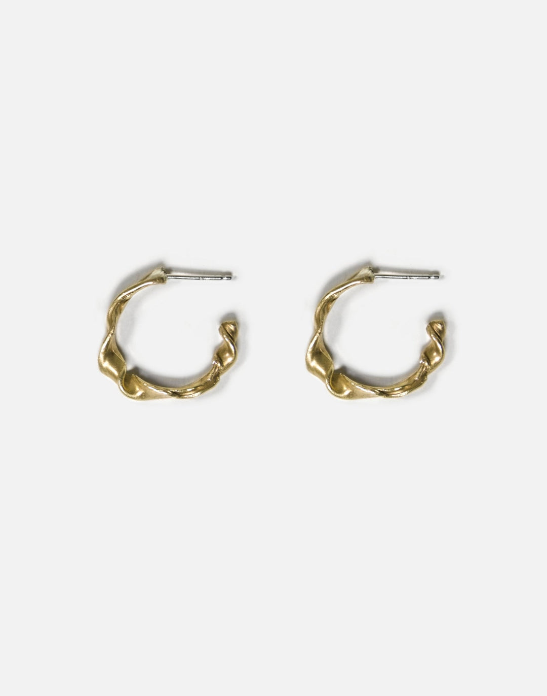 Men's women's Gold twisted hoop earrings essence. Best minimalist jewelry made in Brooklyn New York by llayers.