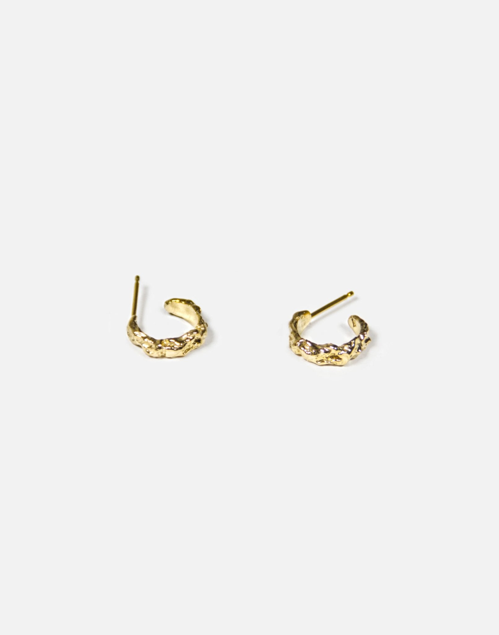 Minimal Gold textured hoop earrings granite. Emerging designer. Best minimalist jewelry made in Brooklyn New York by llayers.