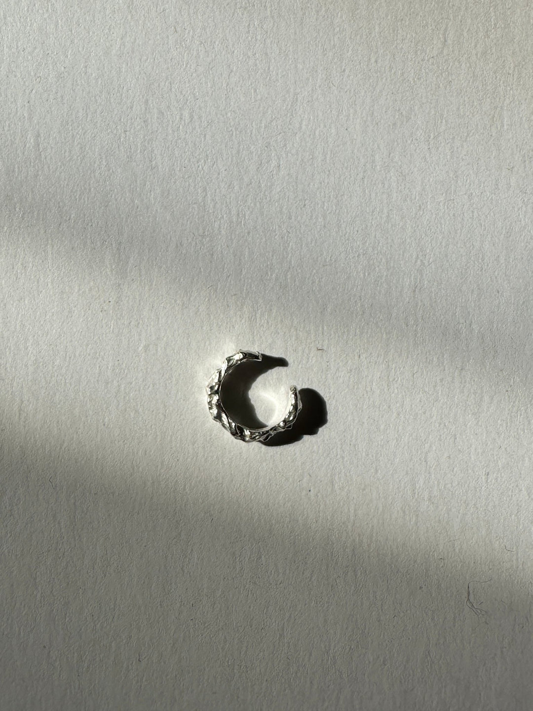 Minimalist Sterling silver textured ear cuff. Emerging designer. Minimalist jewelry made in Brooklyn New York by llayers.