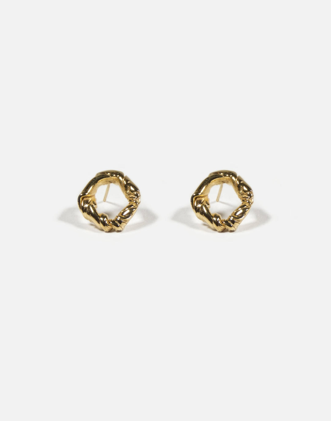 Minimalist modern twisted earrings. Made in Brooklyn New York by designer llayers.