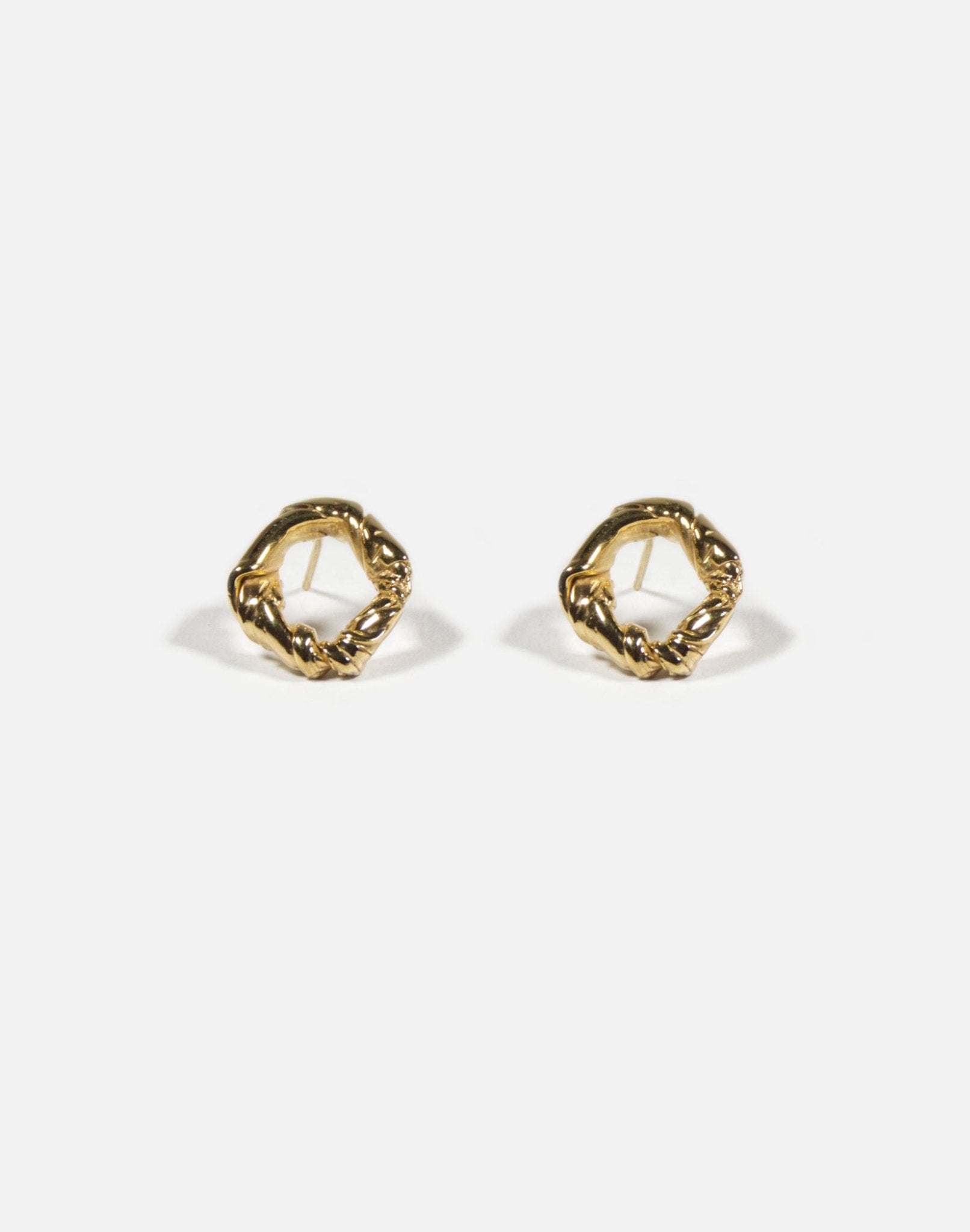 Minimalist modern twisted earrings. Made in Brooklyn New York by designer llayers.