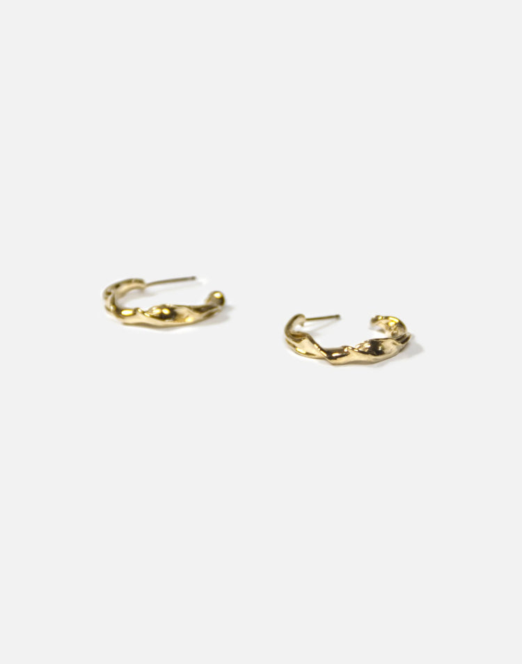 Modern Gold twisted hoop earrings essence. Minimalist jewelry made in Brooklyn New York by llayers.