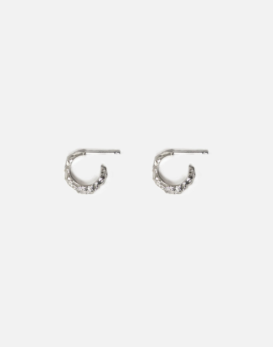 Modern Sterling silver hoop earrings. Emerging designer. Minimalist jewelry made in Brooklyn New York by llayers.