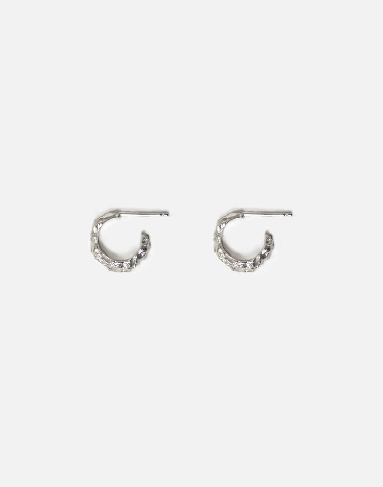 Modern Sterling silver hoop earrings. Emerging designer. Minimalist jewelry made in Brooklyn New York by llayers.