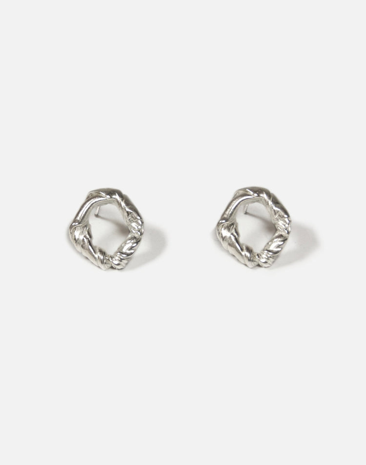 Modern Sterling silver twisted stud earrings. Jewelry made in Brooklyn New York by designer llayers.