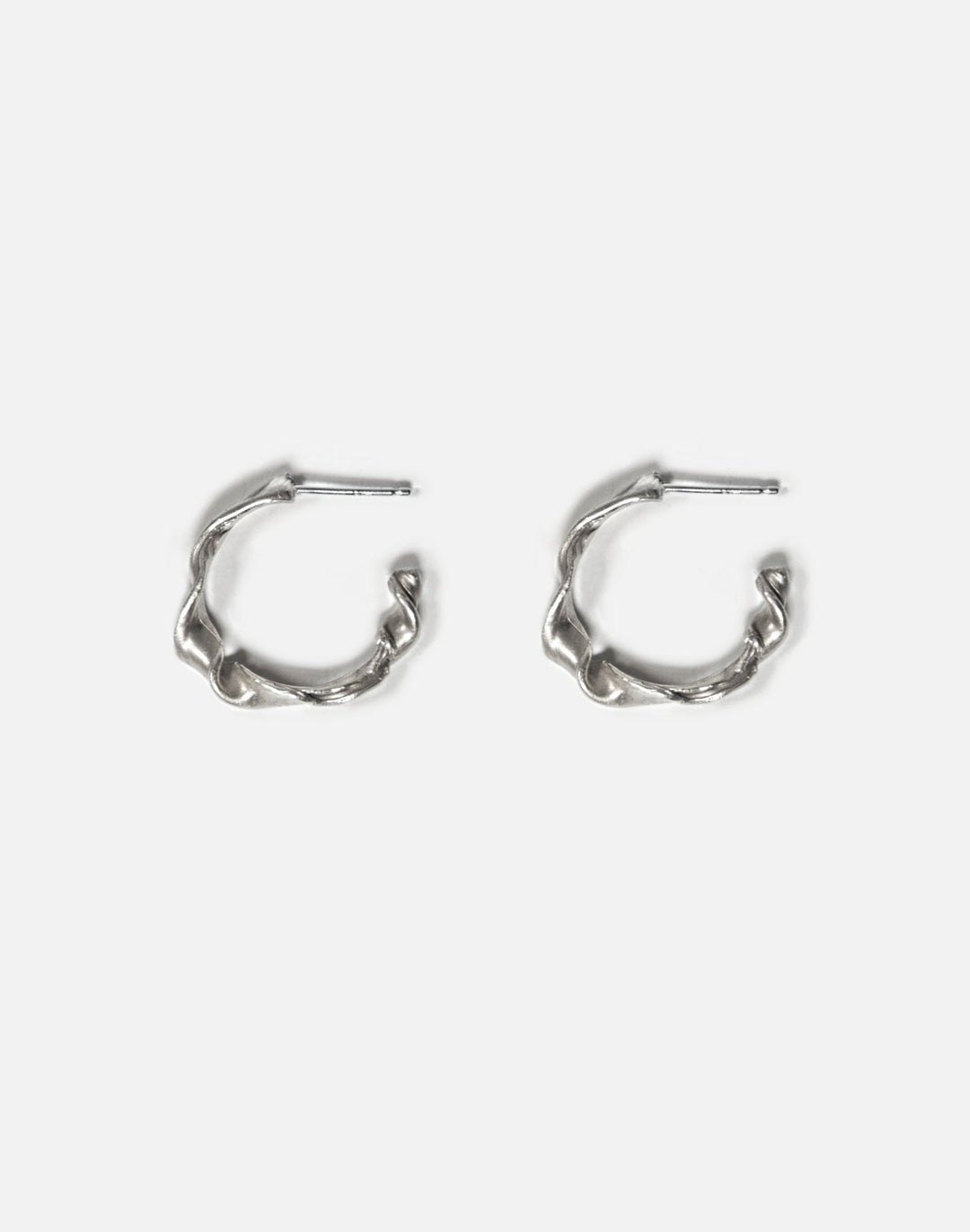 Refined Sterling silver hoop earrings. Chic and minimal jewelry made in Brooklyn New York by llayers.