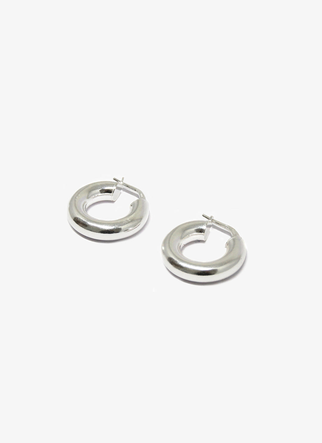 thick silver hoop earrings minimal designer jewelry in brookyn new york hoop 004