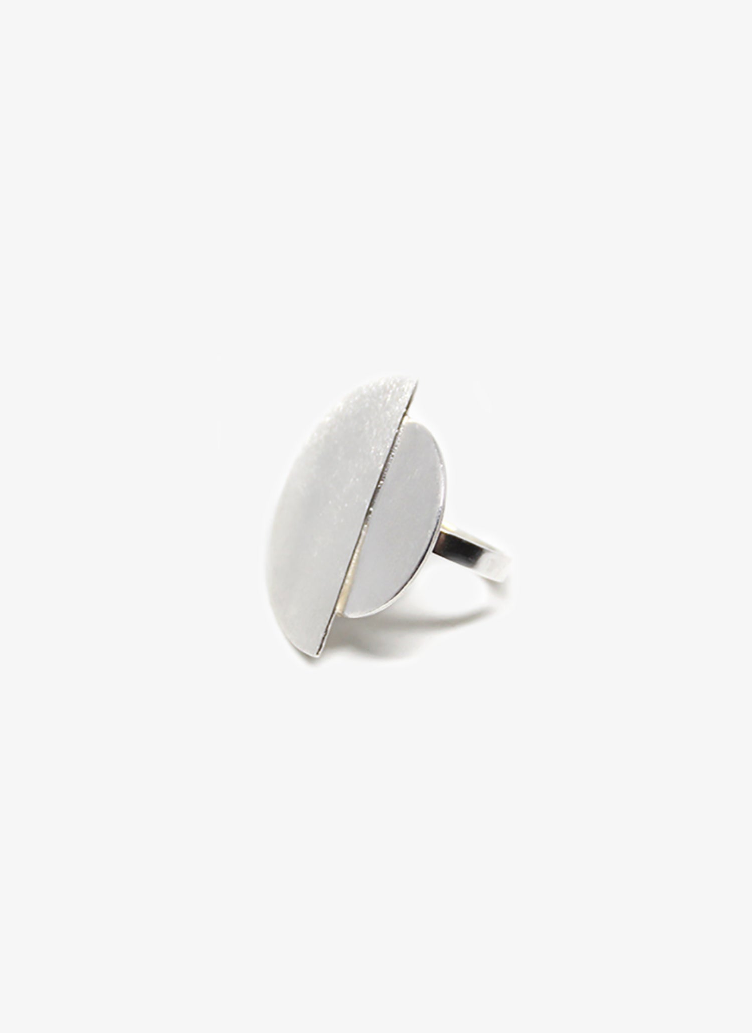 Moon fashion ring with circles. Minimalist modern jewelry handcrafted in Brooklyn New York by designer llayers. Eclipse.