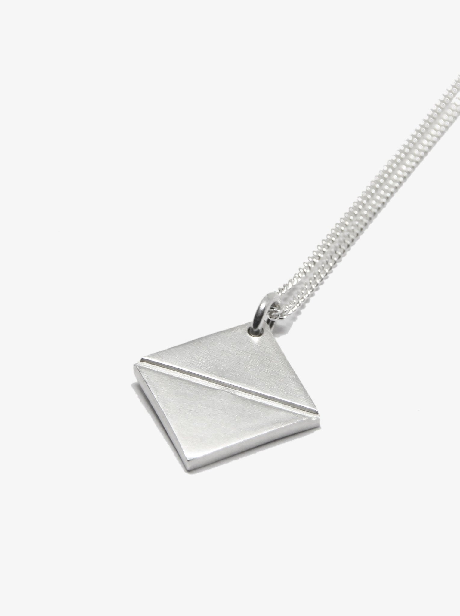 Silver talisman pendant necklace synthesis new york brooklyn by unisex minimalist jewelry designer llayers