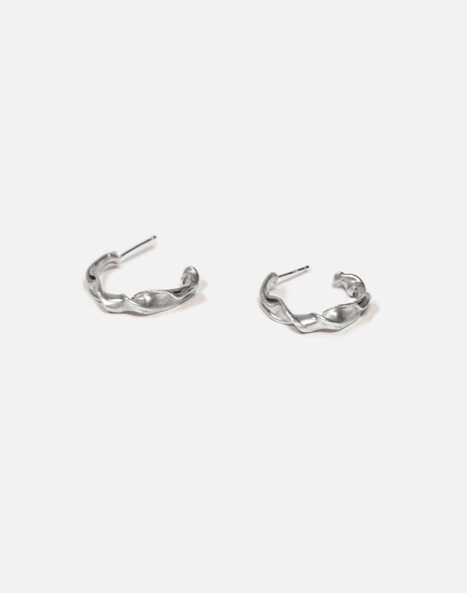 Sterling silver modern hoop earrings. Best affordable jewelry made in Brooklyn New York by llayers.