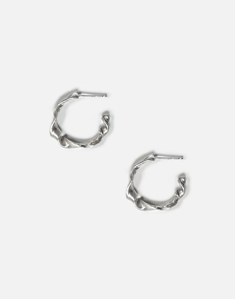 Sterling silver twisted hoop earrings essence. Minimalist jewelry made in Brooklyn New York by llayers.