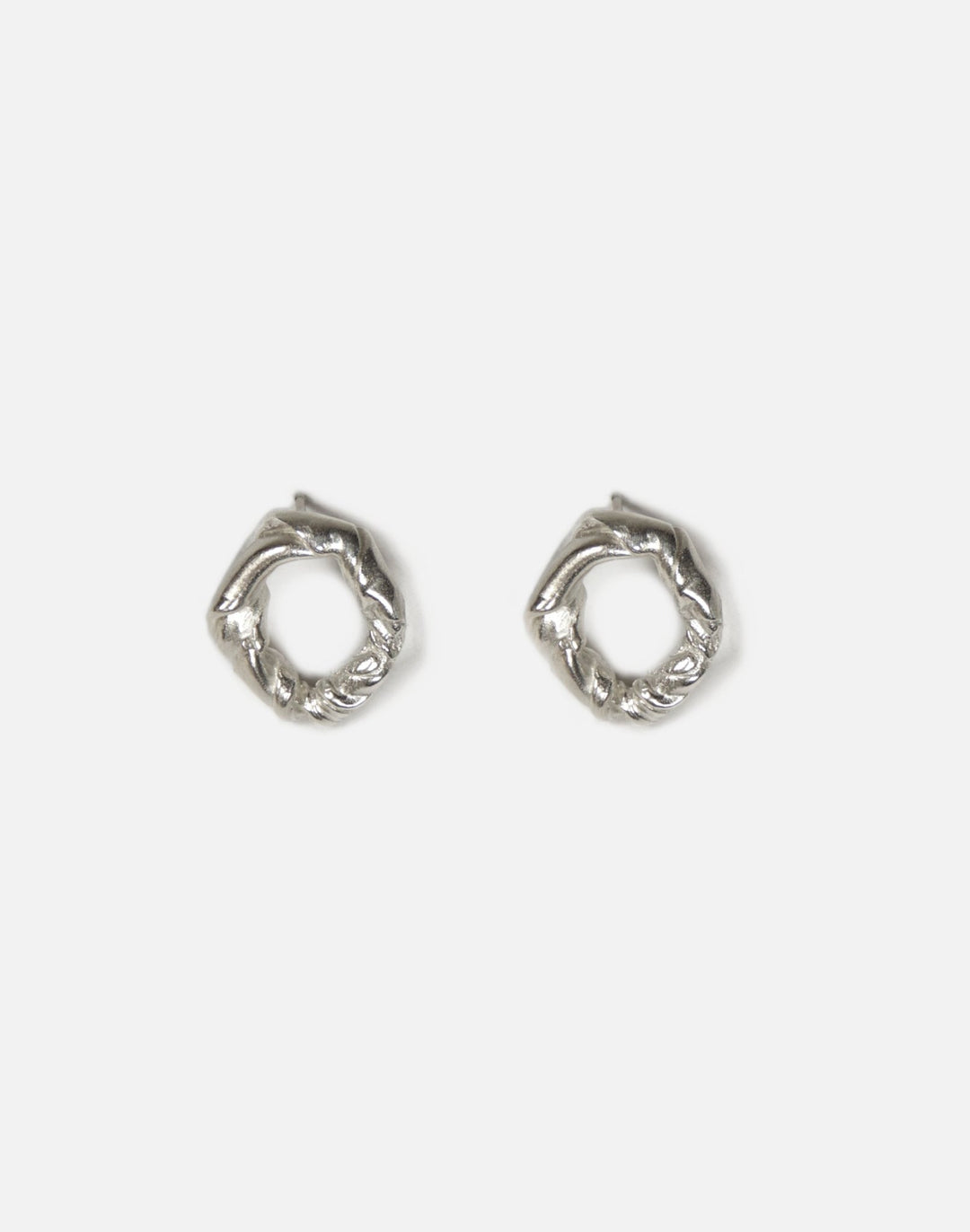 Sterling silver minimalist modern twisted earrings. Jewelry made in Brooklyn New York by designer llayers.