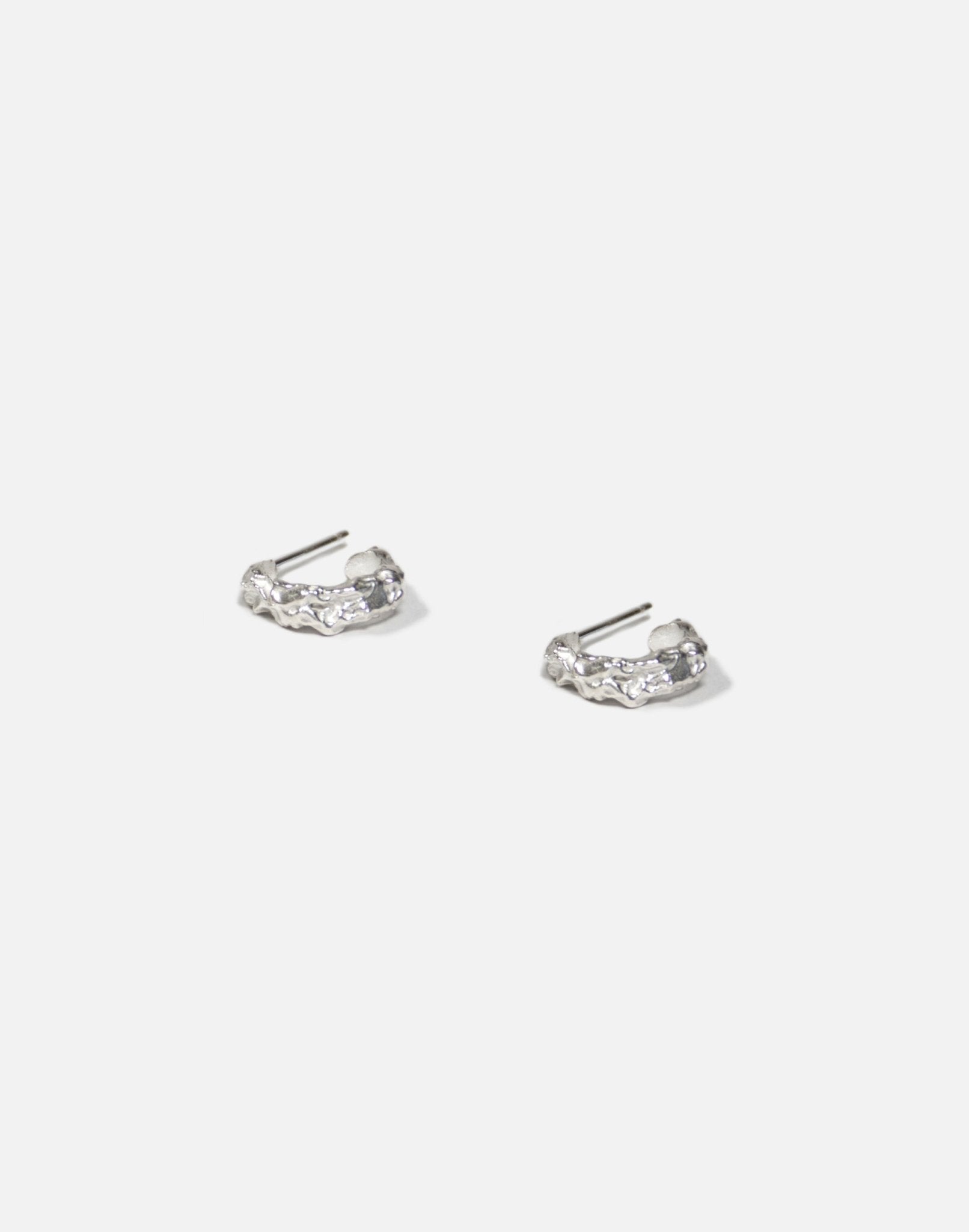 Textured Sterling silver hoop earrings. Emerging designer. Best minimalist jewelry made in Brooklyn New York by llayers.