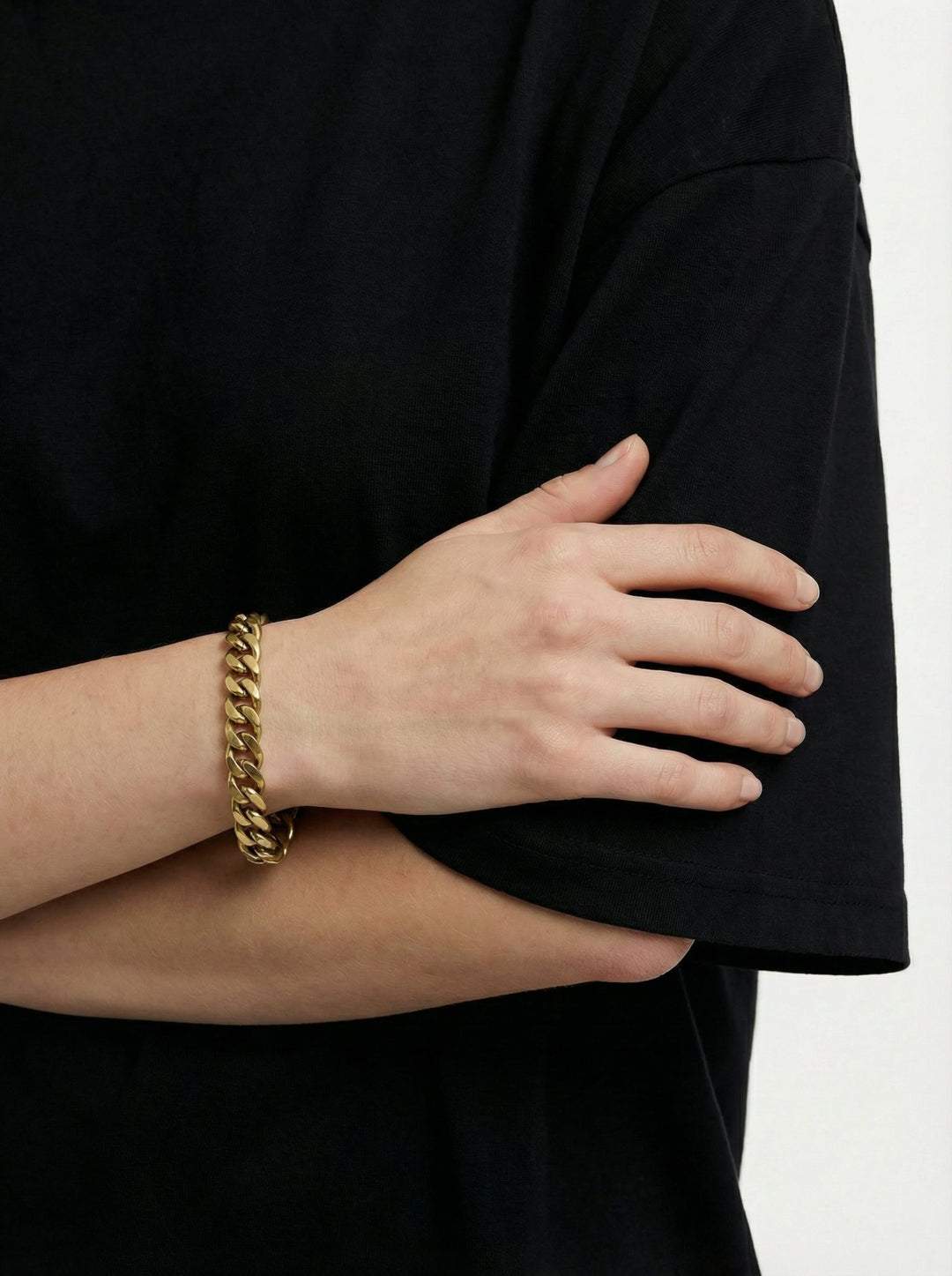 Gold curb chain bracelet in brass. In Brooklyn New York by llayers. Minimal, modern jewelry for men's and women's.
