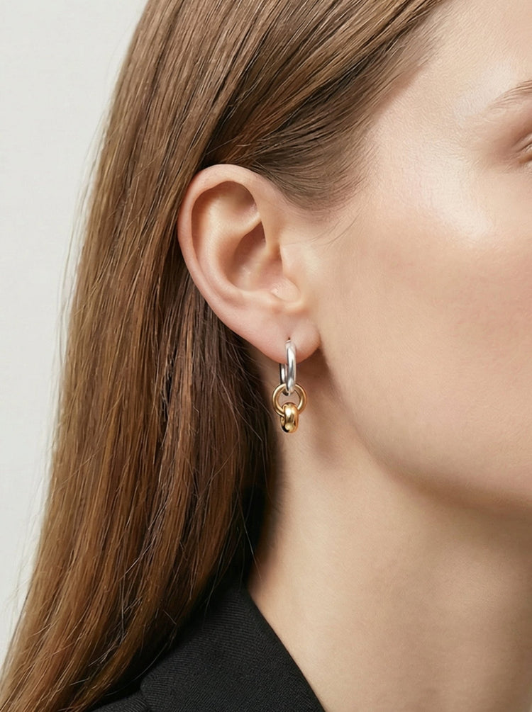 Silver and gold hoop earrings infinity minimal jewelry. Minimalist timeless affordable jewelry made in New York by llayers.