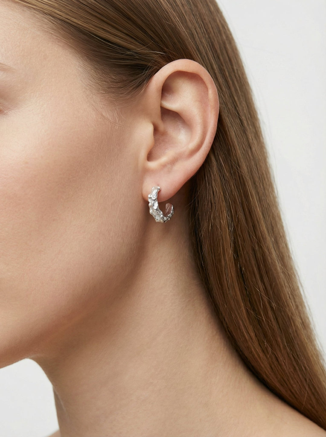 Sterling silver hoop earrings. Minimalist jewelry made in Brooklyn New York by llayers.