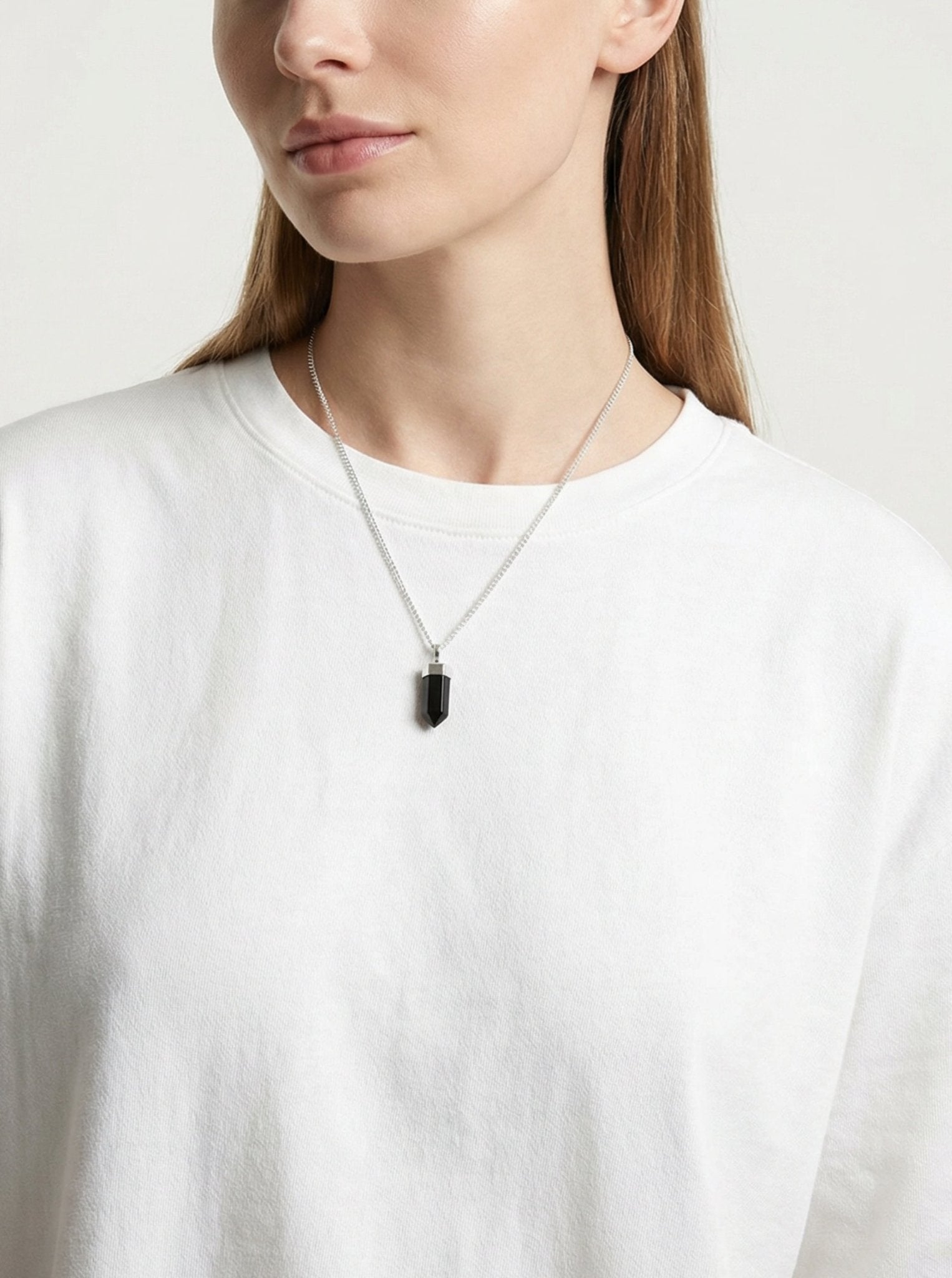 Black agate onyx point pendant silver necklace. Charms and healing crystal stones jewelry in Brooklyn New York by llayers.