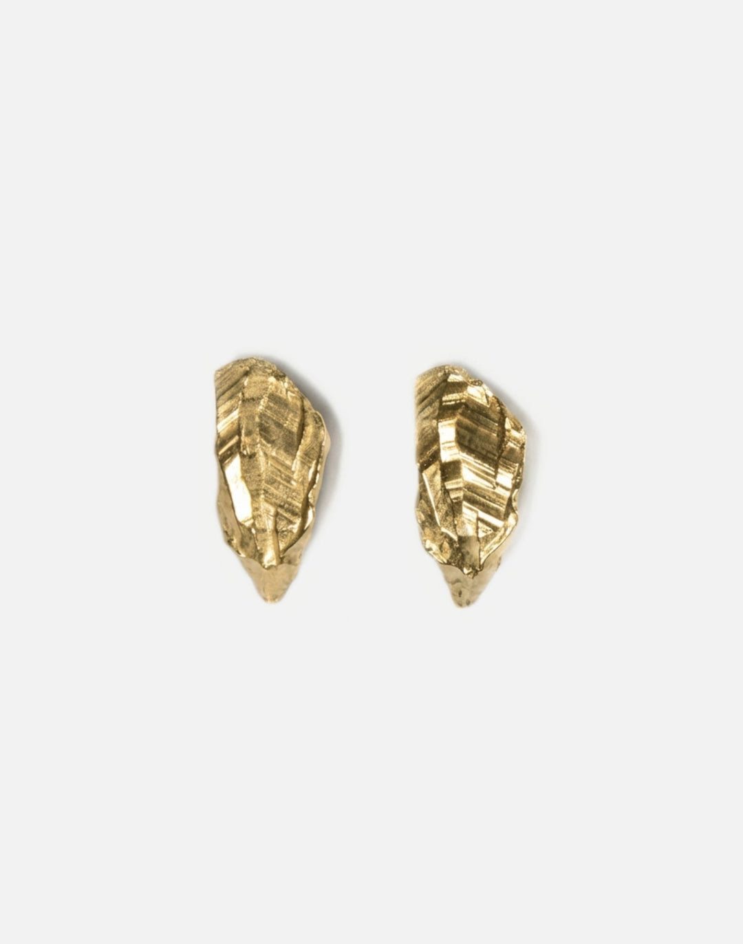 brass sculptural stud earrings. Layered rock formations. Made in new york by llayers.